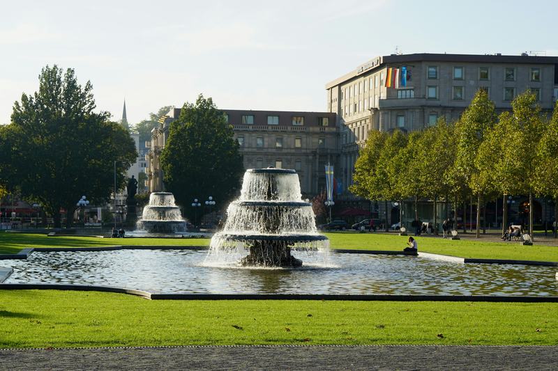 Fountains and lawns in front of historic buildings in Wiesbaden